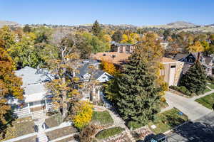 Aerial view of residential area featuring a mountainous background