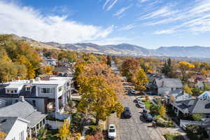 Aerial view of residential area featuring mountains