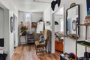 Living area featuring wood finished floors
