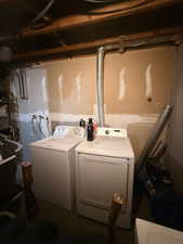 Laundry area featuring washer and clothes dryer