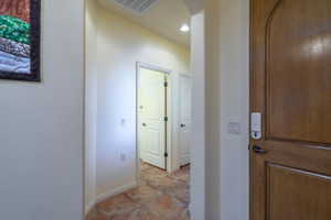 Hallway to 2nd bed and bath