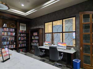 Home office featuring built in desk