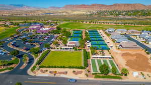 Aerial perspective of suburban area with a mountain backdrop