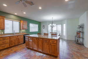 Kitchen island with electrical outlets.