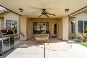 View of patio / terrace featuring a ceiling fan and a grill area
