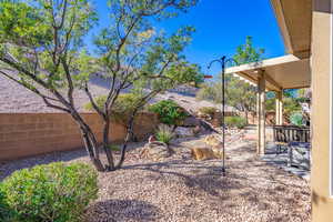 Fenced backyard featuring a patio area