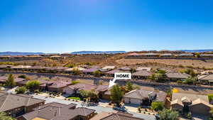 Aerial view of residential area with a mountainous background