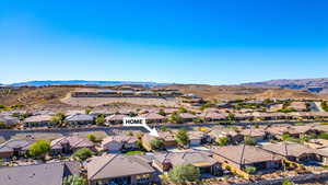 Aerial view of residential area with a mountainous background