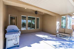 View of patio / terrace with a grill and a ceiling fan