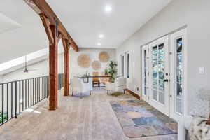 Sitting room with carpet, recessed lighting, and french doors