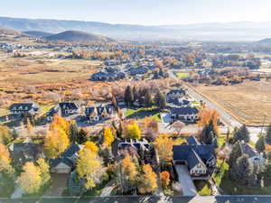 Aerial view of residential area with a mountain backdrop