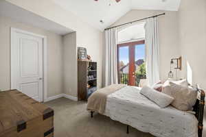 Bedroom featuring lofted ceiling, carpet, access to outside, ceiling fan, and french doors