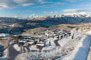 Mountain view with nearby suburban area and a nearby body of water