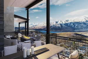 View of patio with an outdoor living space with a fire pit, a water and mountain view, and outdoor dining area