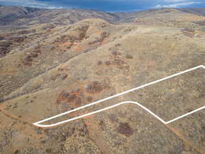 Drone / aerial view of a mountain backdrop