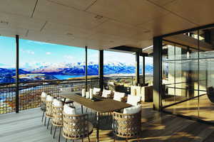Wooden terrace featuring a mountain view