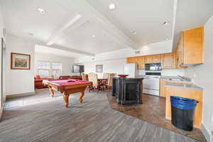 Playroom featuring beam ceiling, billiards table, dark colored carpet, and recessed lighting