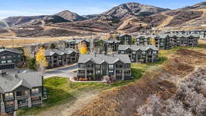Aerial view of residential area with a mountain backdrop