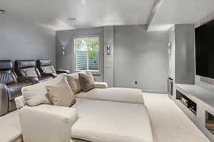 Home theater room with recessed lighting