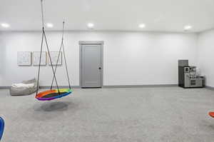 Rec room with carpet flooring and recessed lighting