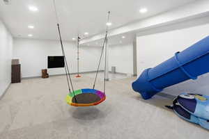Playroom featuring carpet floors and recessed lighting