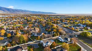 Aerial perspective of suburban area with a mountainous background