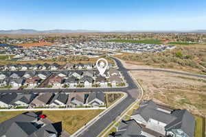 View of property location with nearby suburban area