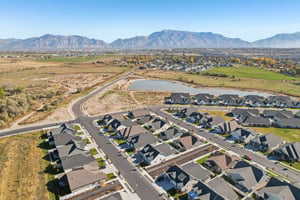 View of property location featuring nearby suburban area and a mountainous background