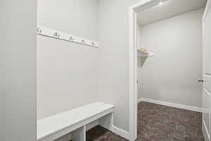 Mudroom featuring baseboards