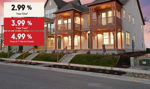 View of front of home featuring a balcony, stucco siding, and covered porch