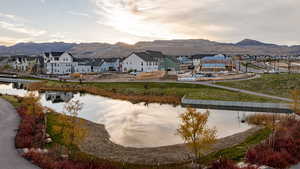 Water view with mountains and nearby suburban area
