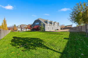 View of fenced backyard
