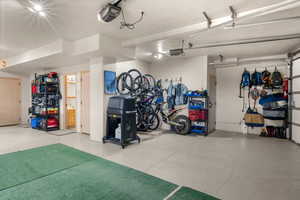 Garage featuring a garage door opener