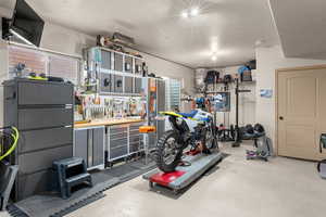 Exercise room featuring a workshop area