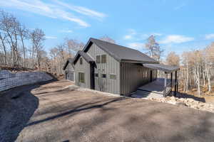 View of side of home featuring board and batten siding