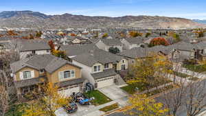 Aerial perspective of suburban area featuring mountains