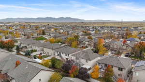 Aerial view of residential area with a mountainous background