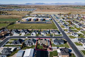 Aerial perspective of suburban area with mountains