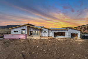 Property under construction featuring a mountain view