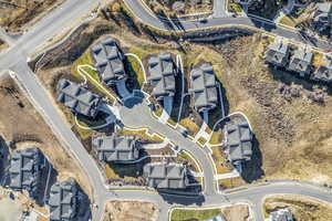 Aerial overview of property's location with nearby suburban area