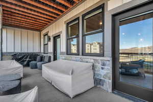 View of patio with an outdoor living space