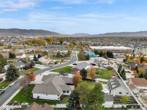 Aerial view of residential area featuring mountains