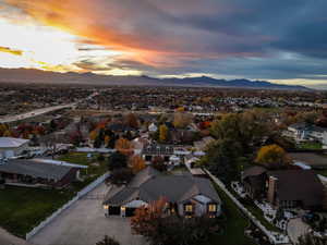 Aerial view at dusk of a residential view and a mountain view