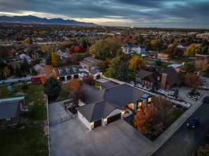 Aerial view of residential area with a mountainous background