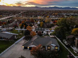 Aerial view at dusk of a residential view and a mountain view