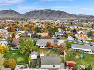 Aerial view of residential area featuring mountains