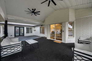 View of patio featuring an outdoor living space, a ceiling fan, and french doors