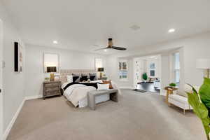 Bedroom featuring light colored carpet, recessed lighting, and ceiling fan