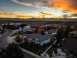 Aerial view of residential area with a mountain backdrop