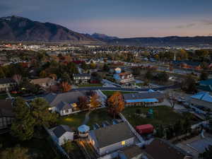 Aerial view at dusk of a mountain view and a residential view